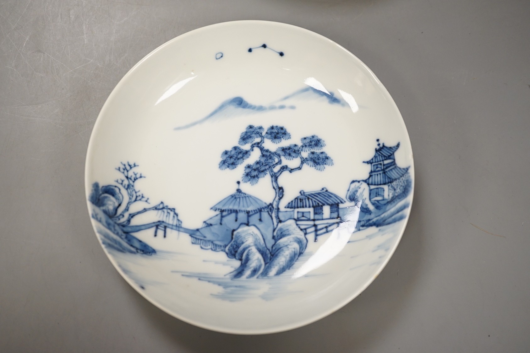 A group of Chinese blue and white: 3 dishes, a tea bowl and a bowl, 18th century